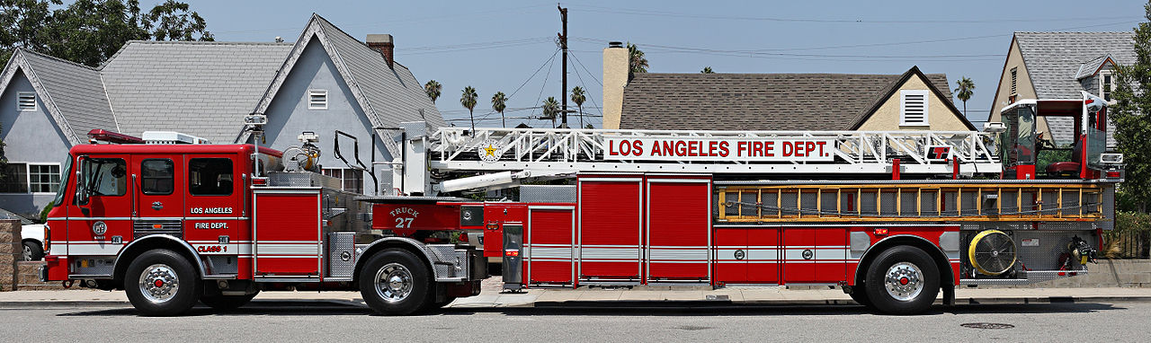 Tiller truck fire engine.